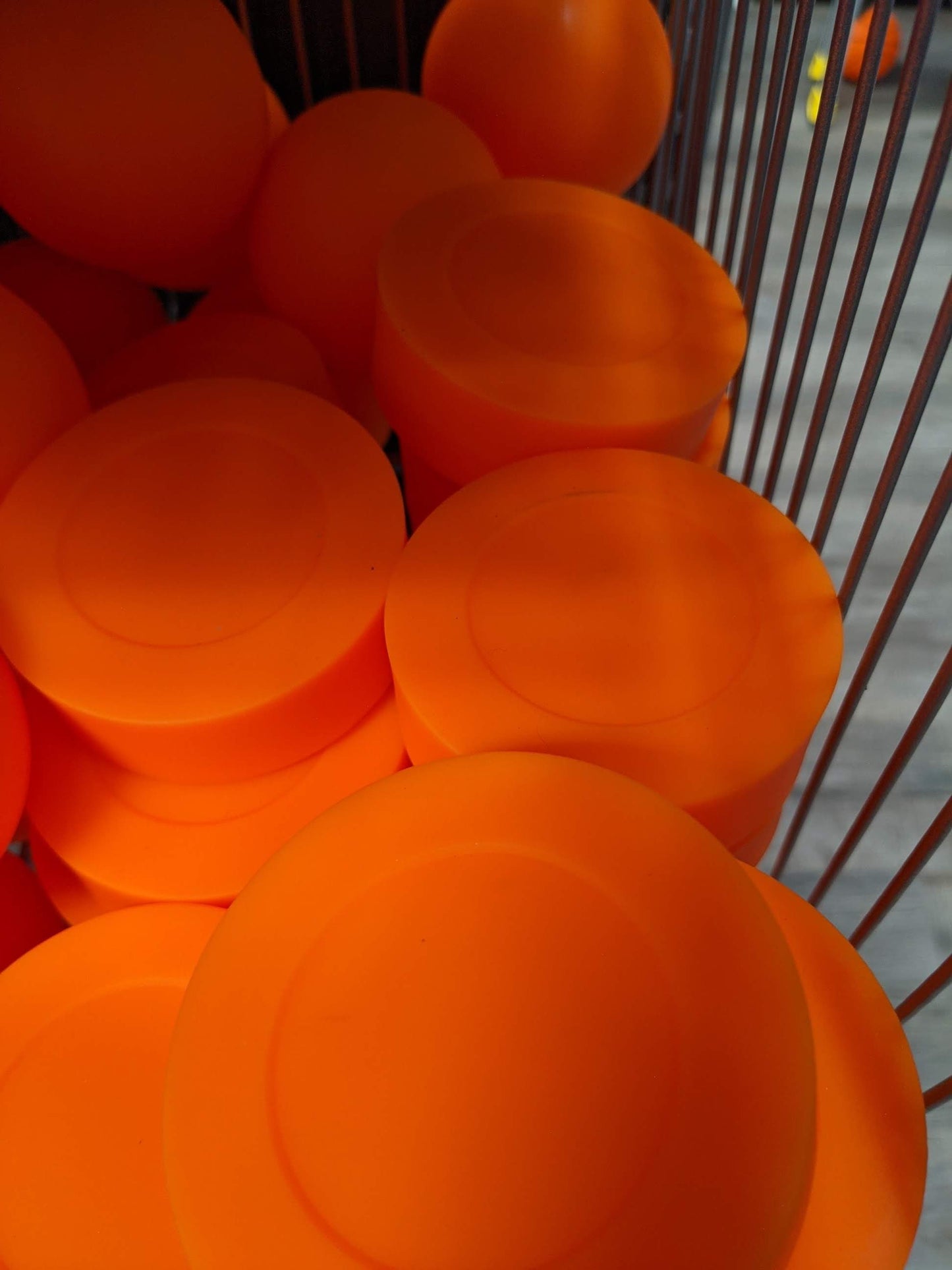 Floor Hockey Balls and Pucks, Orange, New. One Piece.