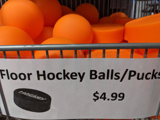 Floor Hockey Balls and Pucks, Orange, New.  One Piece.